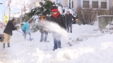   Volunteers shovel out people in need 