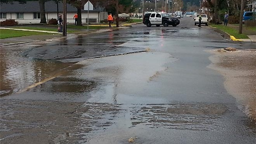 Water line break lifts road, causes cloudy water KVAL